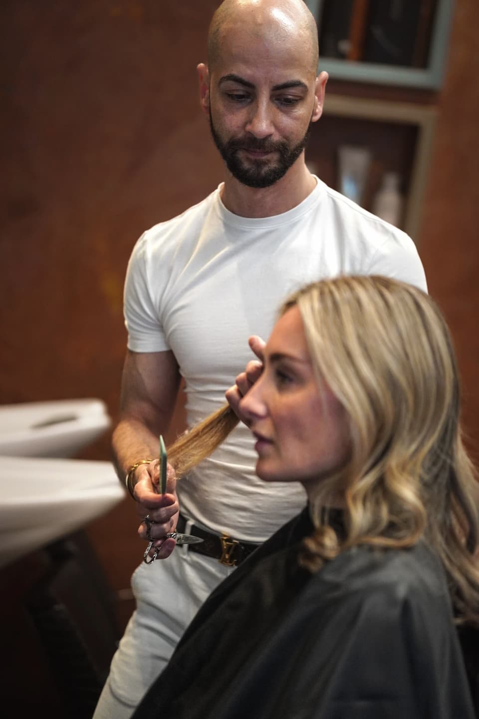 A stylist and client mid-appointment.